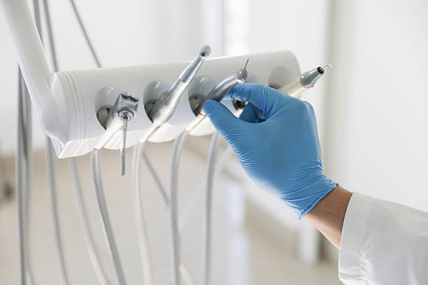 Professional Tooth Extraction technician working in Elk Grove, CA
